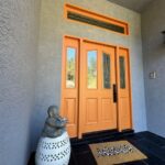 Modern Exterior Paint with Orange Door for House in Oakland CA