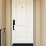 Beautiful Craftsman-style front door featuring a crisp white finish by Paintmasters.