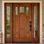 Paintmasters created a custom stain and refinished the entry doors and sidelights. Installation by Mike Bringle.
